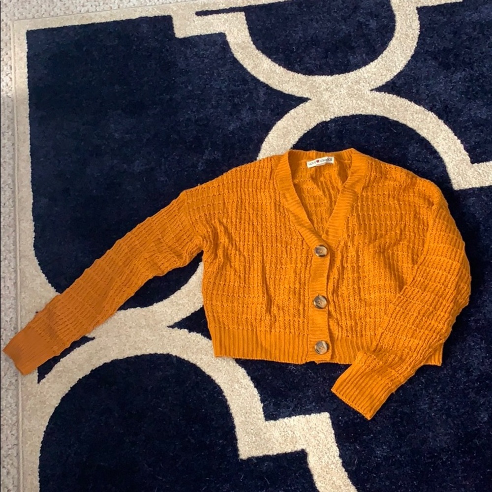 Orange button up sweater
